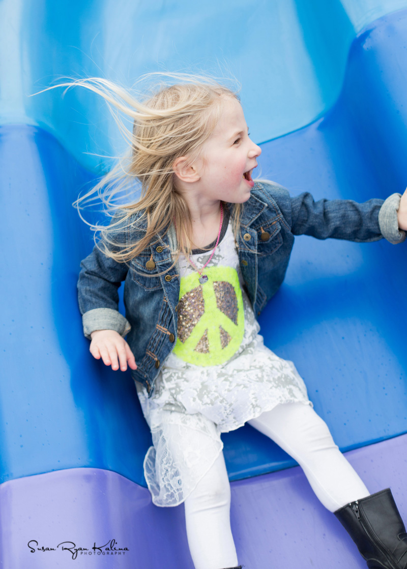 Deerfield IL Modern Family Photo of Child on Blue Slide 