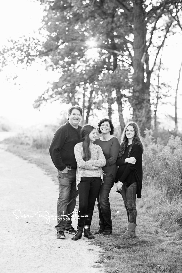 Lake Forest IL Family Photography Fort Sheridan Forest Preserve Beautiful Sun Shining on Family